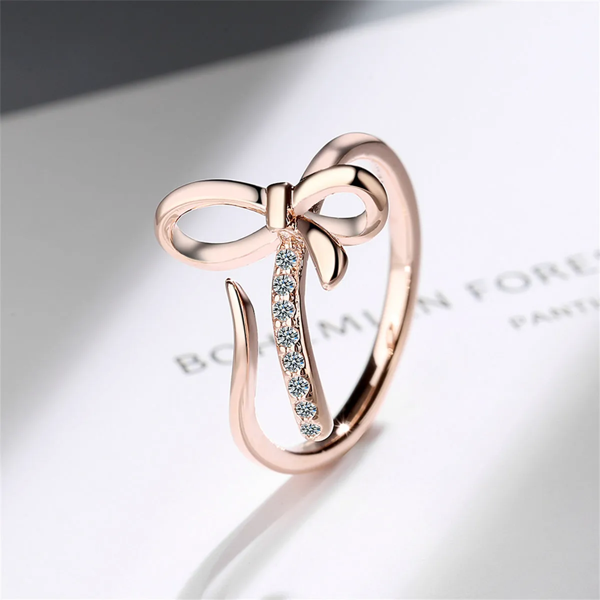 Cubic Zirconia & 18K Rose Gold-Plated Pavé Openwork Bow Bypass Ring